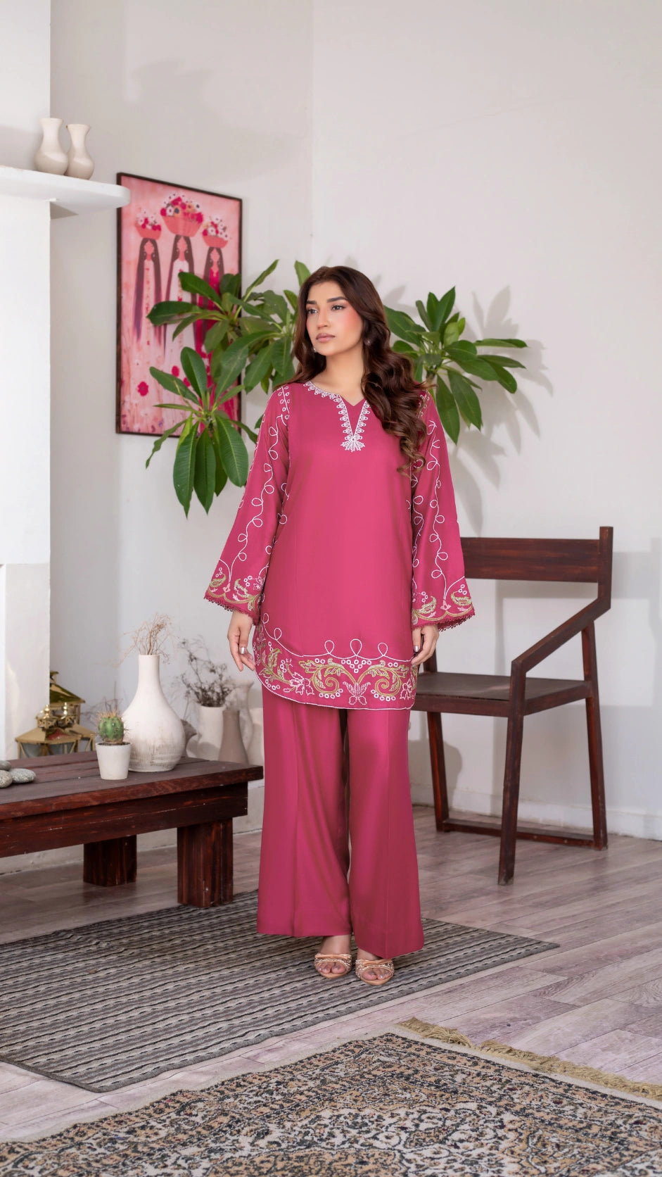 Women’s pink embroidered 2-piece stitched Dhanak suit with matching trousers