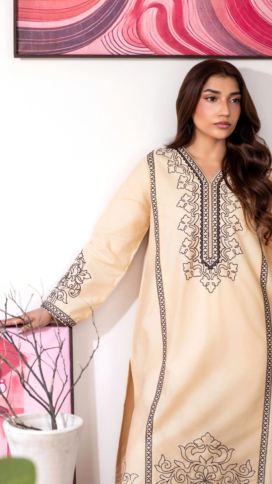 Women wearing elegant lime 2-piece embroidered Cambric suit