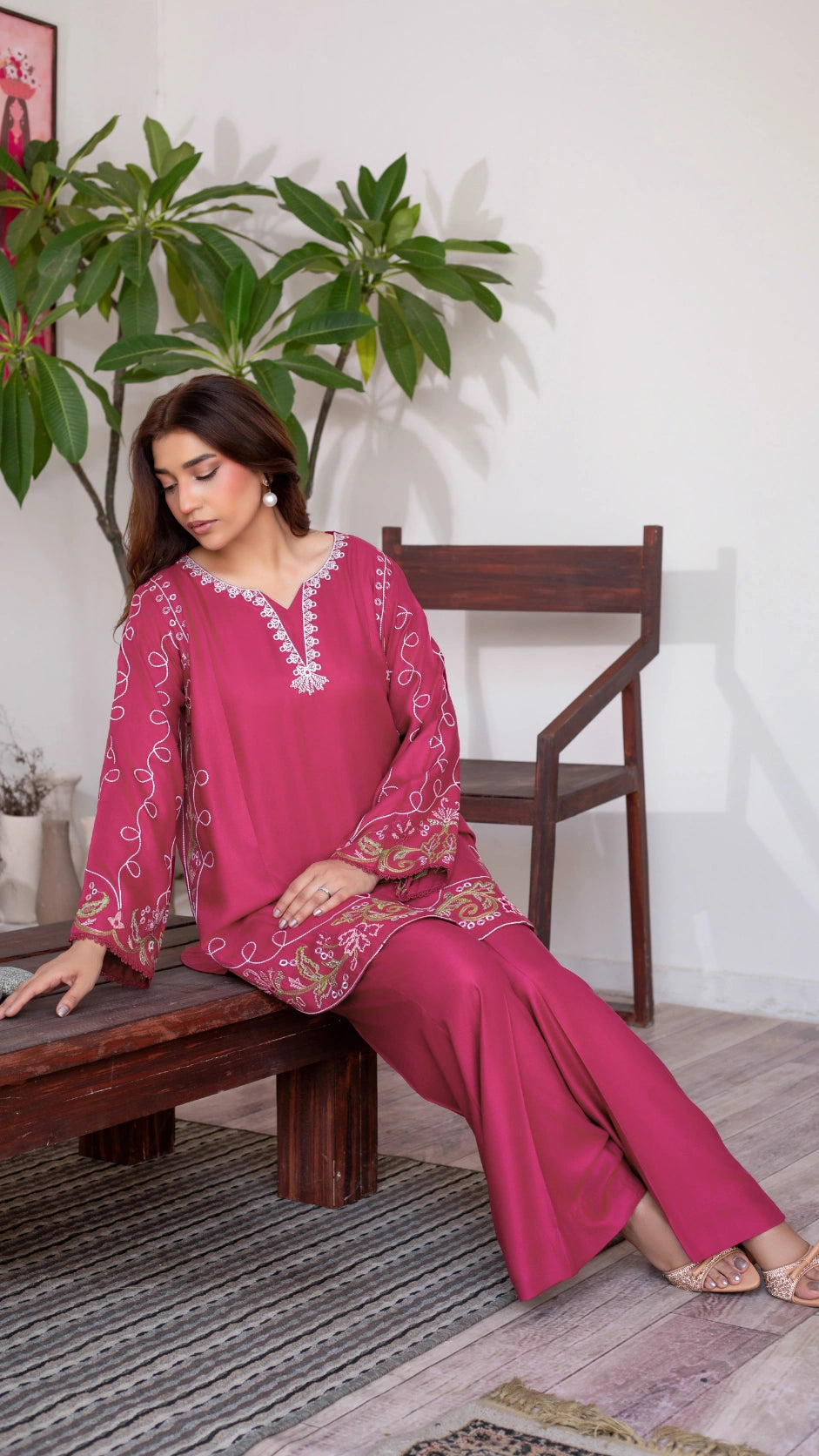 Traditional Pakistani pink Dhanak suit with detailed embroidery