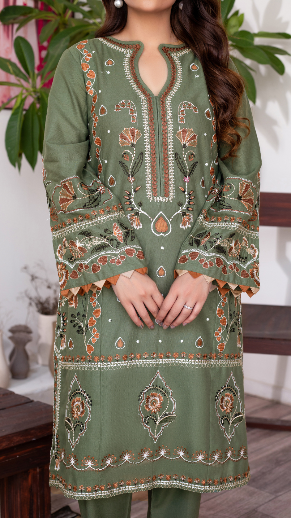Beautifully detailed embroidered shirt with neckline accents