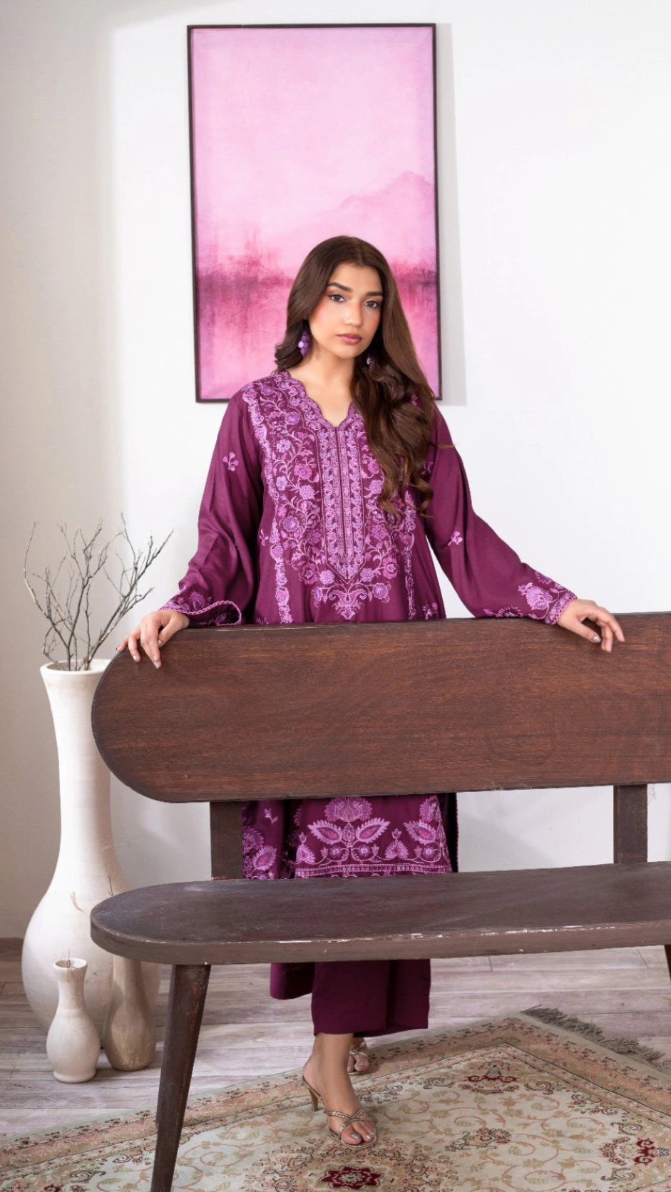 Elegant plum embroidered Pakistani dress with detailed border design